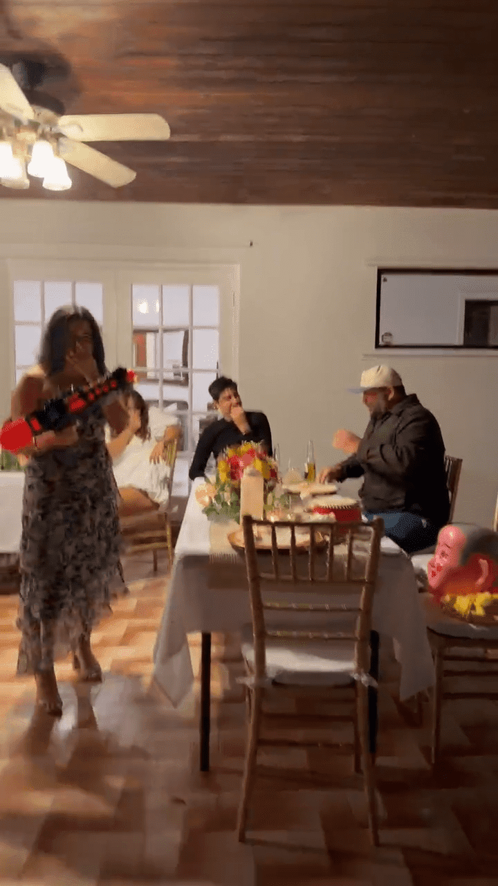 guests interacting with a hibachi chef at home